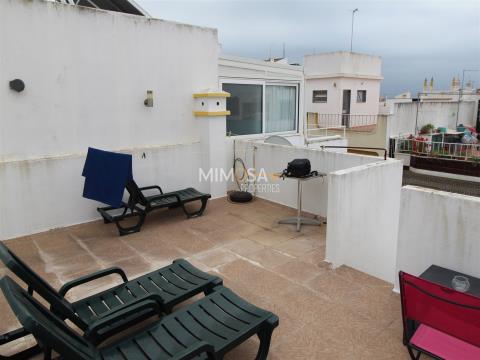 Well located three bedroomed house in centre of Alvor with sea view